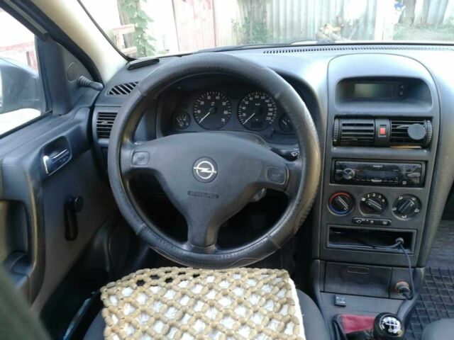 Белый Опель Астра, объемом двигателя 1.4 л и пробегом 370 тыс. км за 3484 $, фото 6 на Automoto.ua