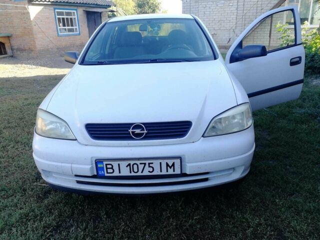 Белый Опель Астра, объемом двигателя 1.4 л и пробегом 370 тыс. км за 3484 $, фото 1 на Automoto.ua