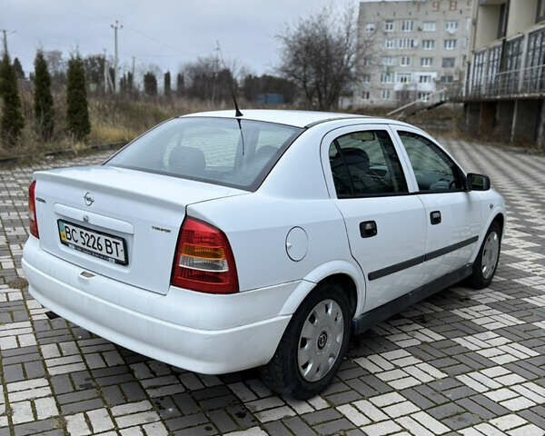 Белый Опель Астра, объемом двигателя 1.6 л и пробегом 280 тыс. км за 2999 $, фото 2 на Automoto.ua
