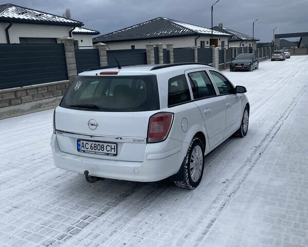 Белый Опель Астра, объемом двигателя 1.69 л и пробегом 285 тыс. км за 4450 $, фото 6 на Automoto.ua