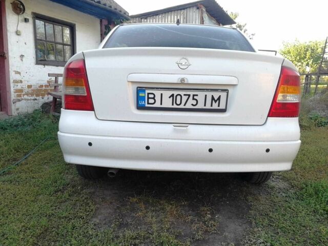 Белый Опель Астра, объемом двигателя 1.4 л и пробегом 370 тыс. км за 3484 $, фото 8 на Automoto.ua