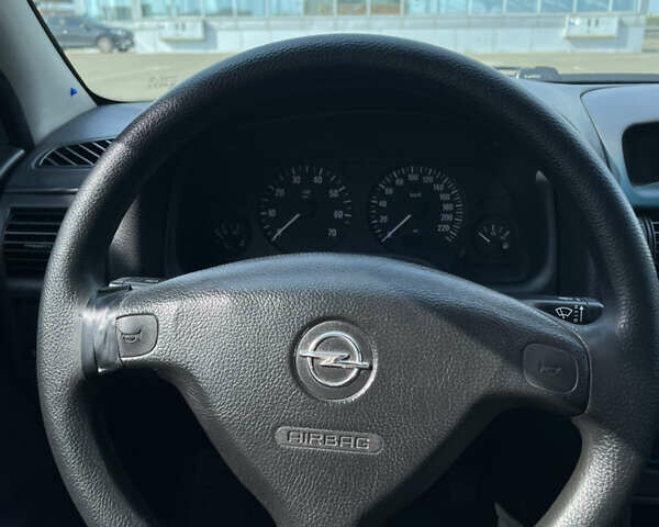 Белый Опель Астра, объемом двигателя 1.6 л и пробегом 222 тыс. км за 4500 $, фото 10 на Automoto.ua