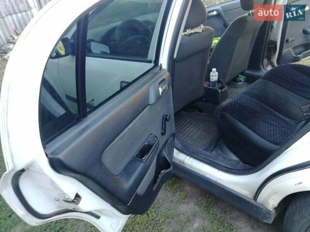 Білий Опель Астра, об'ємом двигуна 1.4 л та пробігом 368 тис. км за 3487 $, фото 6 на Automoto.ua