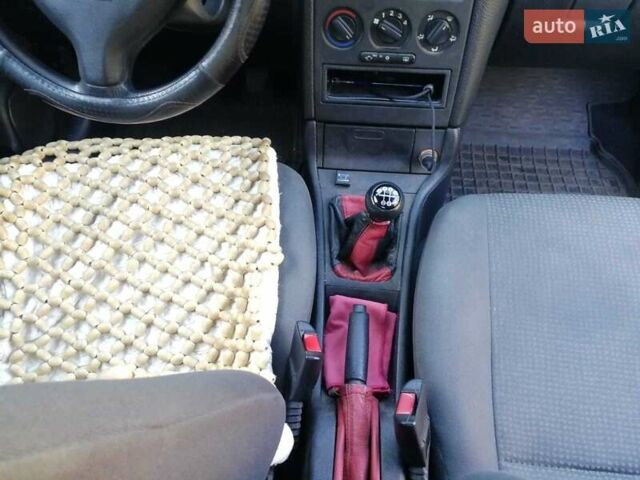 Білий Опель Астра, об'ємом двигуна 1.4 л та пробігом 368 тис. км за 3487 $, фото 10 на Automoto.ua