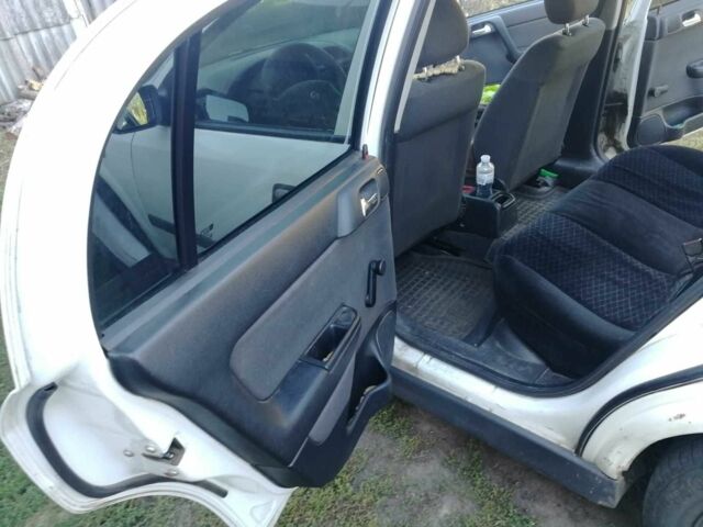 Белый Опель Астра, объемом двигателя 1.4 л и пробегом 370 тыс. км за 3484 $, фото 10 на Automoto.ua