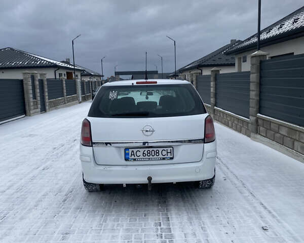 Белый Опель Астра, объемом двигателя 1.69 л и пробегом 285 тыс. км за 4450 $, фото 5 на Automoto.ua