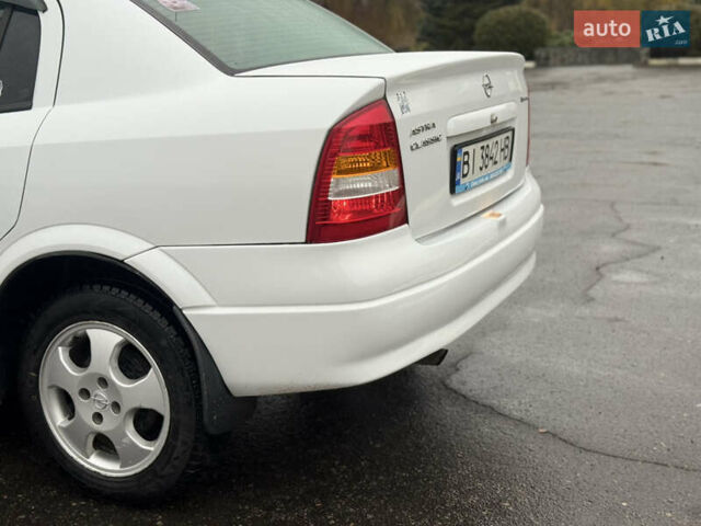Белый Опель Астра, объемом двигателя 1.6 л и пробегом 218 тыс. км за 4900 $, фото 11 на Automoto.ua