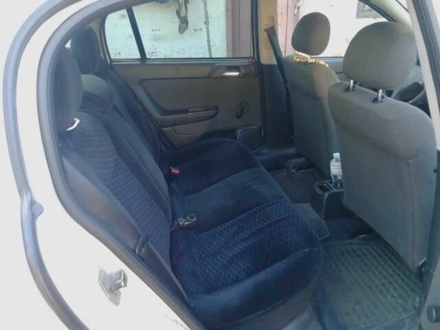 Белый Опель Астра, объемом двигателя 1.4 л и пробегом 370 тыс. км за 3484 $, фото 12 на Automoto.ua