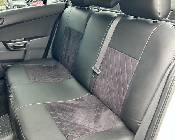 Білий Опель Астра, об'ємом двигуна 1.69 л та пробігом 168 тис. км за 7000 $, фото 13 на Automoto.ua