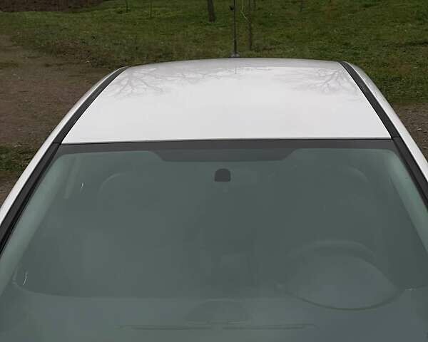 Белый Опель Астра, объемом двигателя 1.4 л и пробегом 166 тыс. км за 7500 $, фото 2 на Automoto.ua