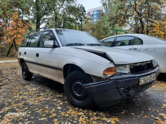 Белый Опель Астра, объемом двигателя 1.8 л и пробегом 243 тыс. км за 500 $, фото 4 на Automoto.ua