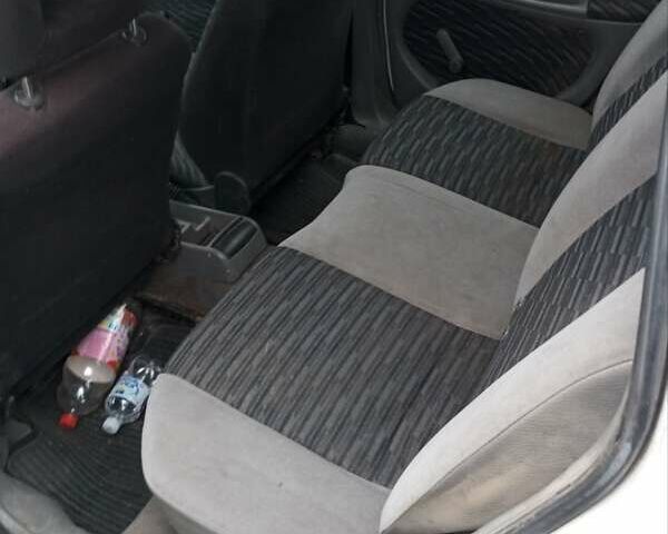 Білий Опель Астра, об'ємом двигуна 1.69 л та пробігом 333 тис. км за 999 $, фото 2 на Automoto.ua