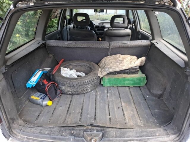 Белый Опель Астра, объемом двигателя 1.4 л и пробегом 111 тыс. км за 1500 $, фото 5 на Automoto.ua