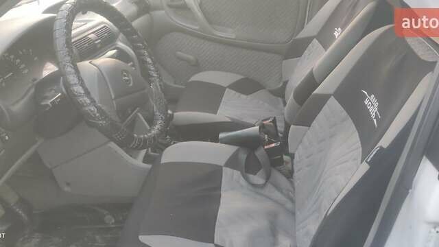 Белый Опель Астра, объемом двигателя 1.36 л и пробегом 230 тыс. км за 2700 $, фото 11 на Automoto.ua