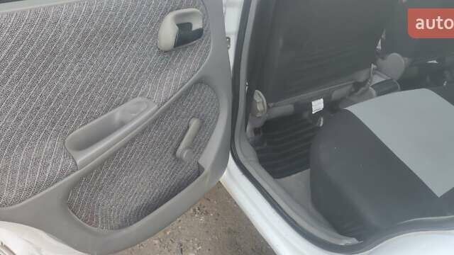 Белый Опель Астра, объемом двигателя 1.36 л и пробегом 230 тыс. км за 2700 $, фото 8 на Automoto.ua