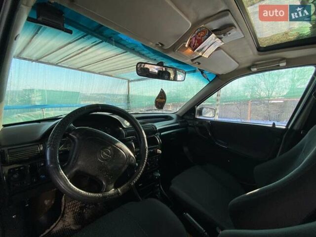 Белый Опель Астра, объемом двигателя 1.6 л и пробегом 140 тыс. км за 2300 $, фото 13 на Automoto.ua