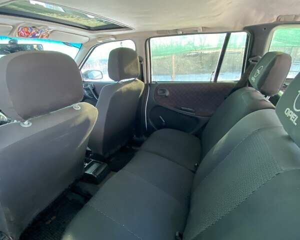 Белый Опель Астра, объемом двигателя 1.6 л и пробегом 140 тыс. км за 2300 $, фото 3 на Automoto.ua