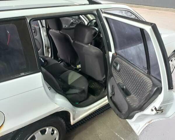 Белый Опель Астра, объемом двигателя 1.4 л и пробегом 245 тыс. км за 1900 $, фото 19 на Automoto.ua