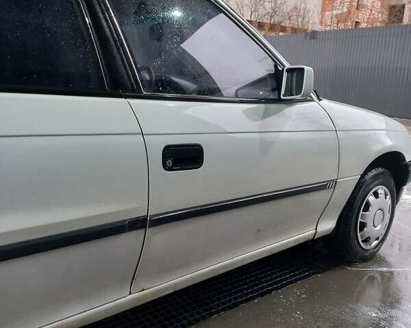 Белый Опель Астра, объемом двигателя 1.4 л и пробегом 245 тыс. км за 1900 $, фото 21 на Automoto.ua