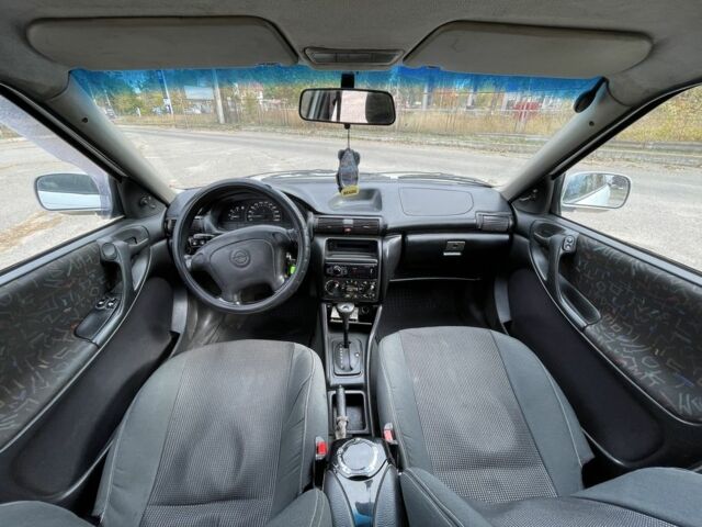 Белый Опель Астра, объемом двигателя 0 л и пробегом 350 тыс. км за 1000 $, фото 4 на Automoto.ua