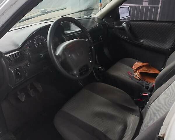 Белый Опель Астра, объемом двигателя 1.4 л и пробегом 245 тыс. км за 1900 $, фото 23 на Automoto.ua