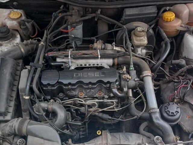 Белый Опель Астра, объемом двигателя 1.7 л и пробегом 300 тыс. км за 1000 $, фото 5 на Automoto.ua