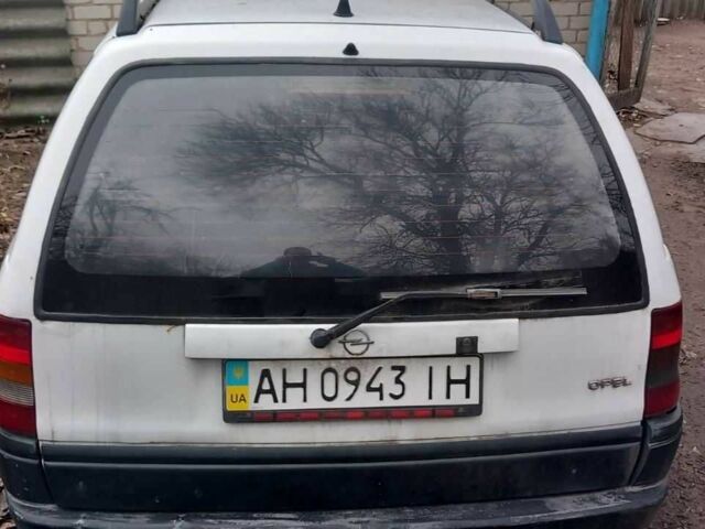 Белый Опель Астра, объемом двигателя 1.7 л и пробегом 300 тыс. км за 1000 $, фото 1 на Automoto.ua