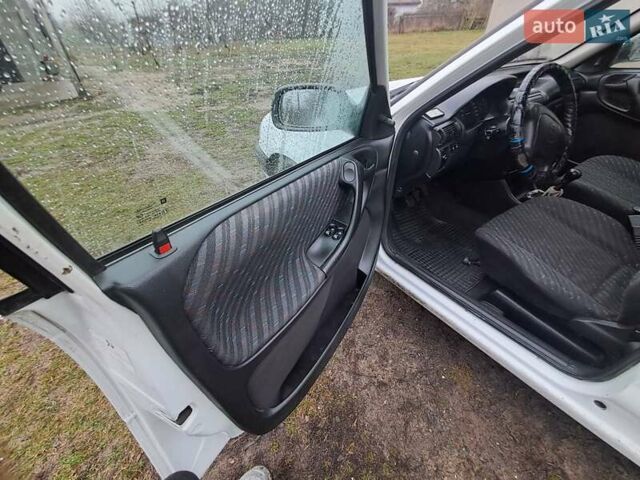 Білий Опель Астра, об'ємом двигуна 1.4 л та пробігом 240 тис. км за 1450 $, фото 11 на Automoto.ua