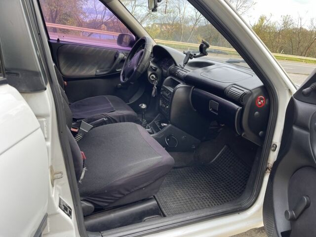 Белый Опель Астра, объемом двигателя 1.4 л и пробегом 335 тыс. км за 2250 $, фото 8 на Automoto.ua