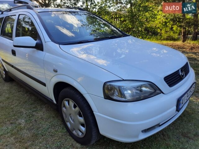 Білий Опель Астра, об'ємом двигуна 1.6 л та пробігом 250 тис. км за 3900 $, фото 35 на Automoto.ua