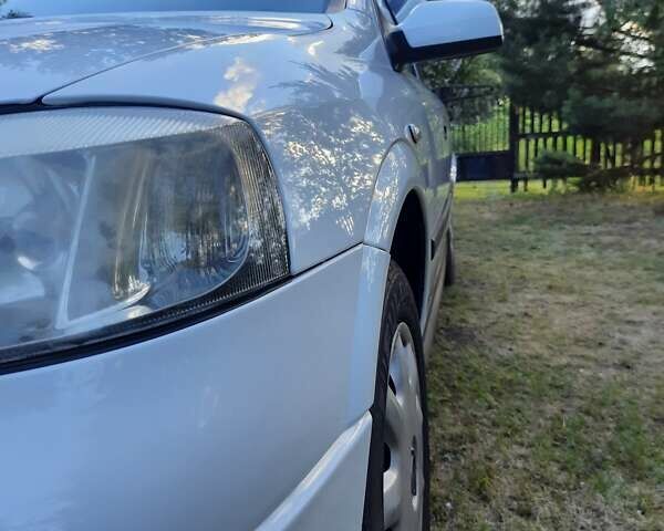 Белый Опель Астра, объемом двигателя 1.6 л и пробегом 250 тыс. км за 3900 $, фото 39 на Automoto.ua