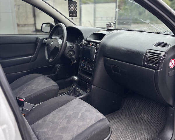 Белый Опель Астра, объемом двигателя 1.8 л и пробегом 280 тыс. км за 3100 $, фото 8 на Automoto.ua