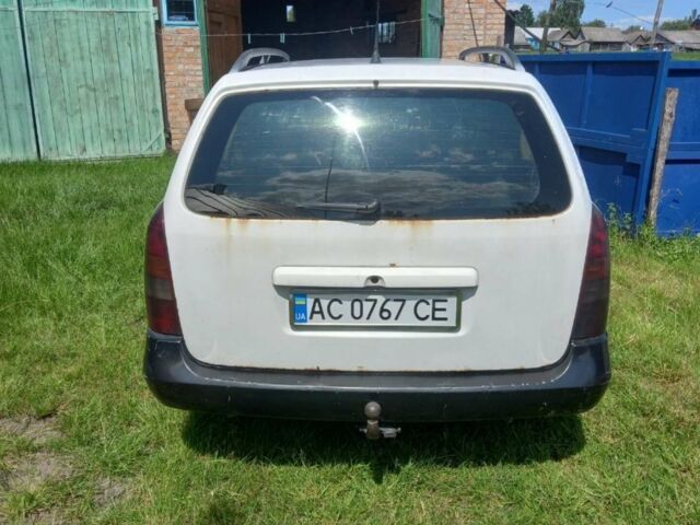 Белый Опель Астра, объемом двигателя 2 л и пробегом 230 тыс. км за 1700 $, фото 1 на Automoto.ua