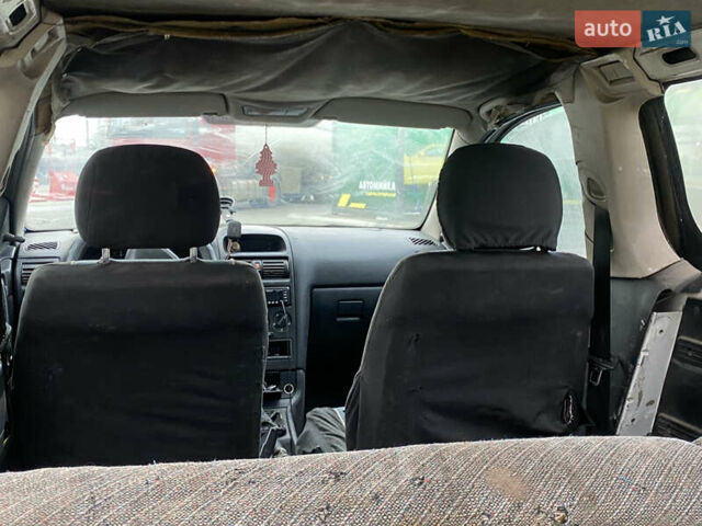 Белый Опель Астра, объемом двигателя 1.69 л и пробегом 450 тыс. км за 1650 $, фото 10 на Automoto.ua