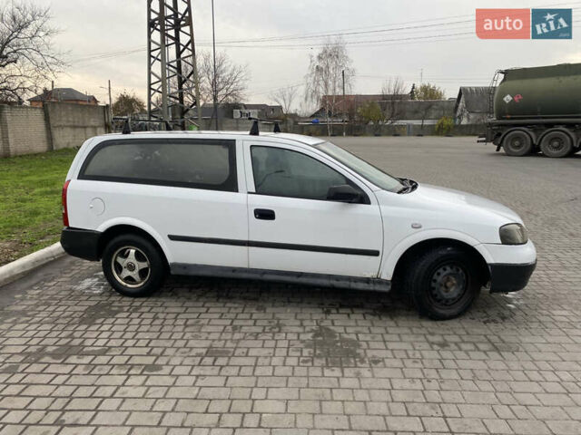 Белый Опель Астра, объемом двигателя 1.69 л и пробегом 450 тыс. км за 1650 $, фото 4 на Automoto.ua