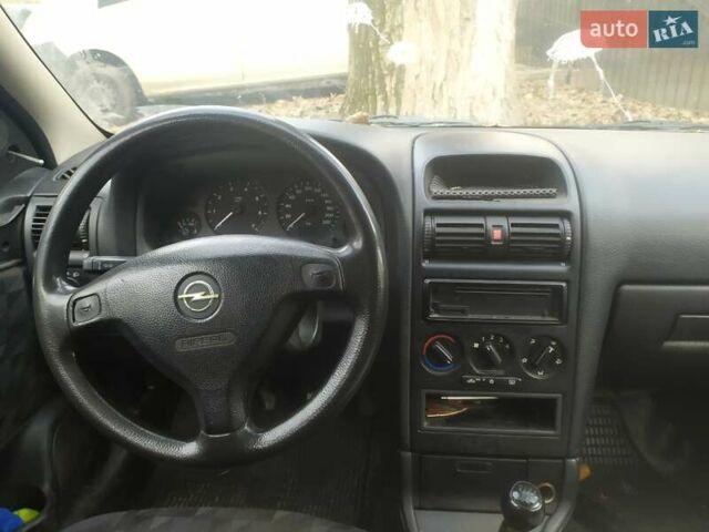 Белый Опель Астра, объемом двигателя 1.6 л и пробегом 336 тыс. км за 1950 $, фото 9 на Automoto.ua