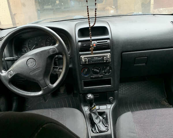 Белый Опель Астра, объемом двигателя 1.7 л и пробегом 400 тыс. км за 2400 $, фото 5 на Automoto.ua