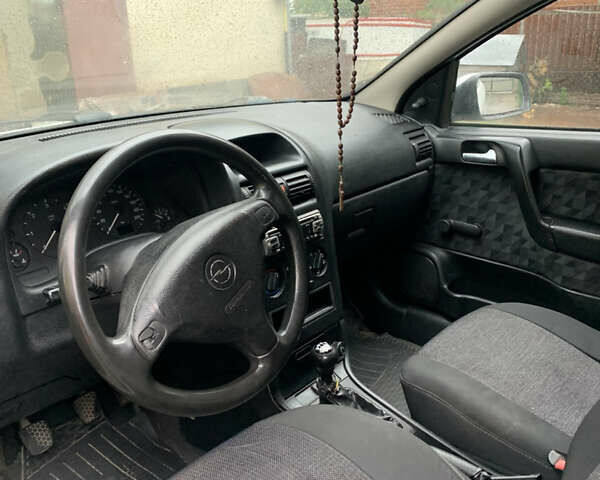 Белый Опель Астра, объемом двигателя 1.7 л и пробегом 400 тыс. км за 2400 $, фото 7 на Automoto.ua