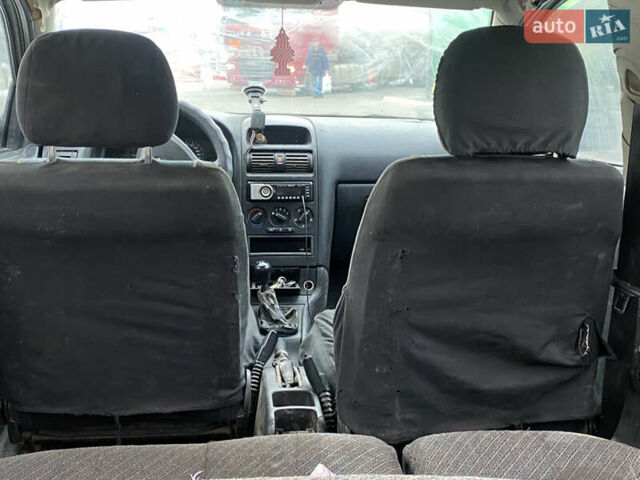 Белый Опель Астра, объемом двигателя 1.69 л и пробегом 450 тыс. км за 1650 $, фото 9 на Automoto.ua