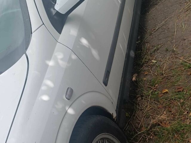 Белый Опель Астра, объемом двигателя 1.6 л и пробегом 300 тыс. км за 800 $, фото 2 на Automoto.ua