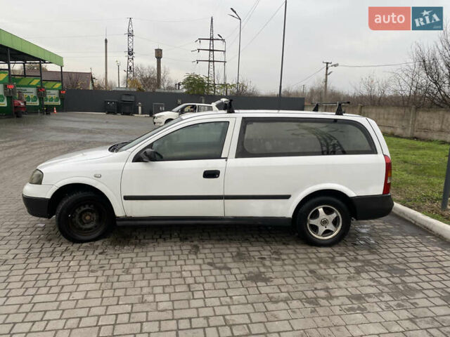 Белый Опель Астра, объемом двигателя 1.69 л и пробегом 450 тыс. км за 1650 $, фото 3 на Automoto.ua