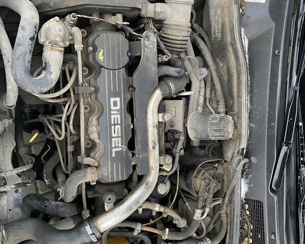 Белый Опель Астра, объемом двигателя 1.69 л и пробегом 450 тыс. км за 1650 $, фото 7 на Automoto.ua