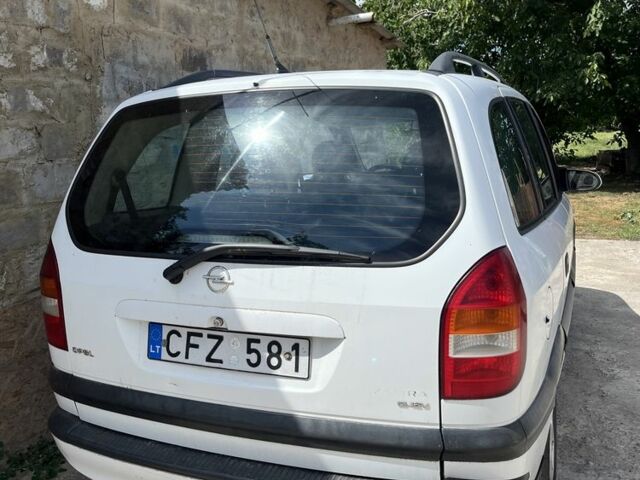 Белый Опель Астра, объемом двигателя 2 л и пробегом 250 тыс. км за 1200 $, фото 3 на Automoto.ua