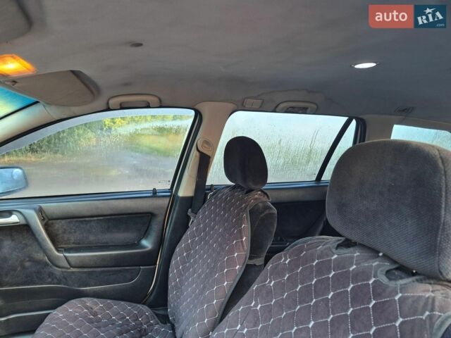 Белый Опель Астра, объемом двигателя 2 л и пробегом 459 тыс. км за 1750 $, фото 21 на Automoto.ua