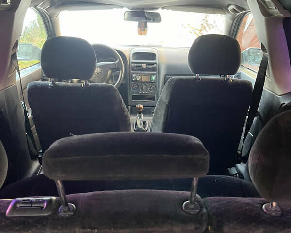 Белый Опель Астра, объемом двигателя 1.7 л и пробегом 300 тыс. км за 1650 $, фото 7 на Automoto.ua