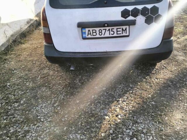 Белый Опель Астра, объемом двигателя 1.7 л и пробегом 285 тыс. км за 1350 $, фото 2 на Automoto.ua