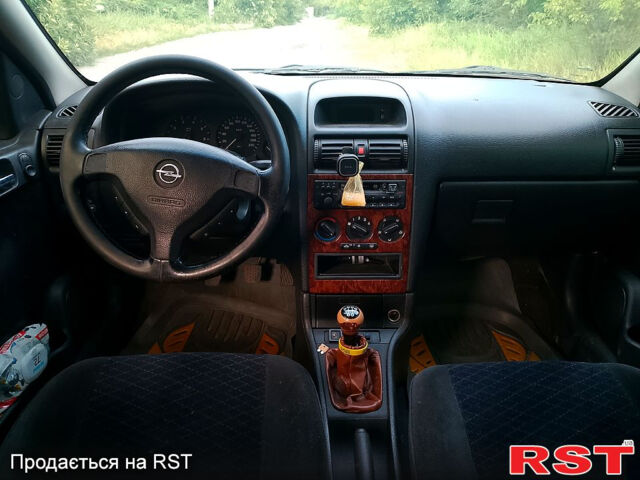 Белый Опель Астра, объемом двигателя 1.8 л и пробегом 250 тыс. км за 2500 $, фото 6 на Automoto.ua