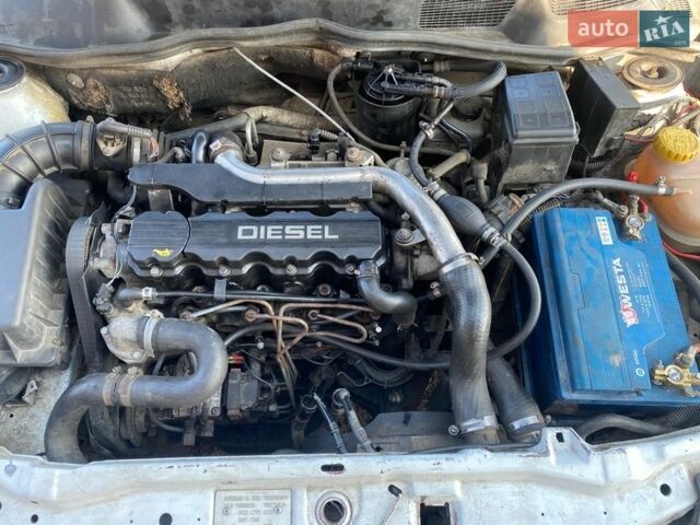 Белый Опель Астра, объемом двигателя 1.7 л и пробегом 385 тыс. км за 1599 $, фото 10 на Automoto.ua