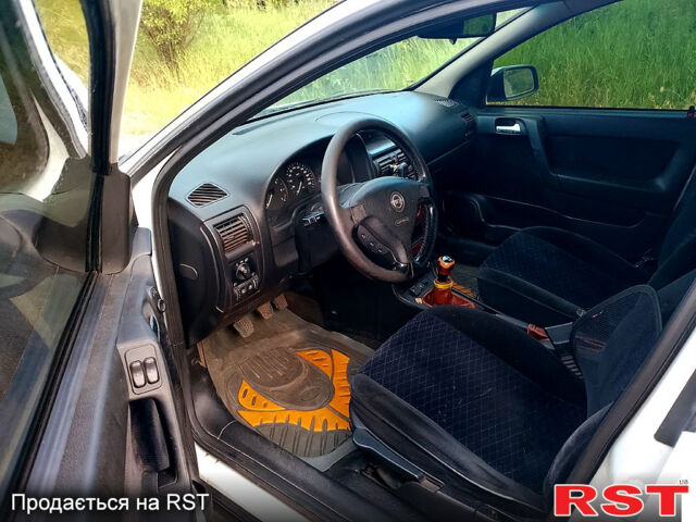 Белый Опель Астра, объемом двигателя 1.8 л и пробегом 250 тыс. км за 2500 $, фото 7 на Automoto.ua