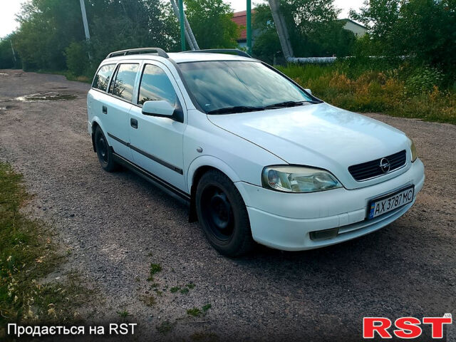 Белый Опель Астра, объемом двигателя 1.8 л и пробегом 250 тыс. км за 2500 $, фото 2 на Automoto.ua